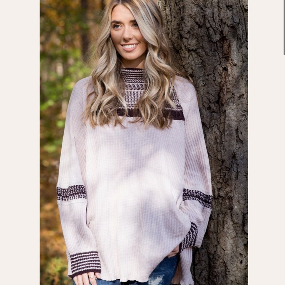 A long sleeve flowy top! WORN ONCE